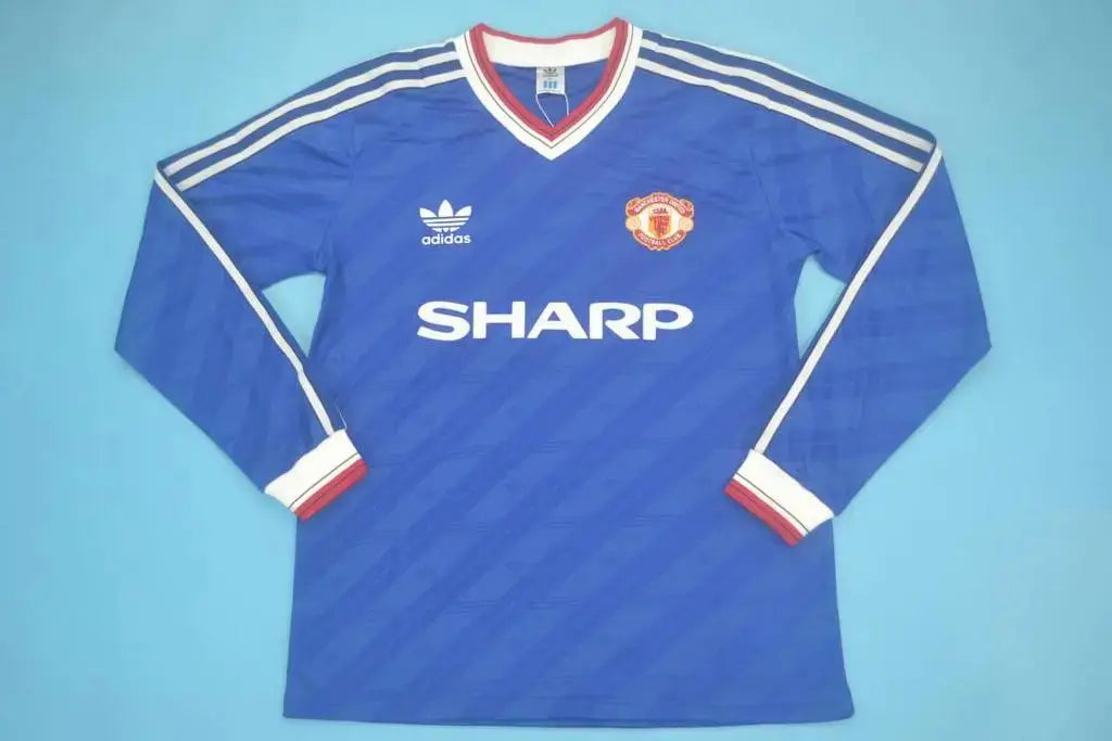 MAILLOT RETRO MANCHESTER UNITED EXTÉRIEUR 1986/1988 VERSION MANCHES LONGUES